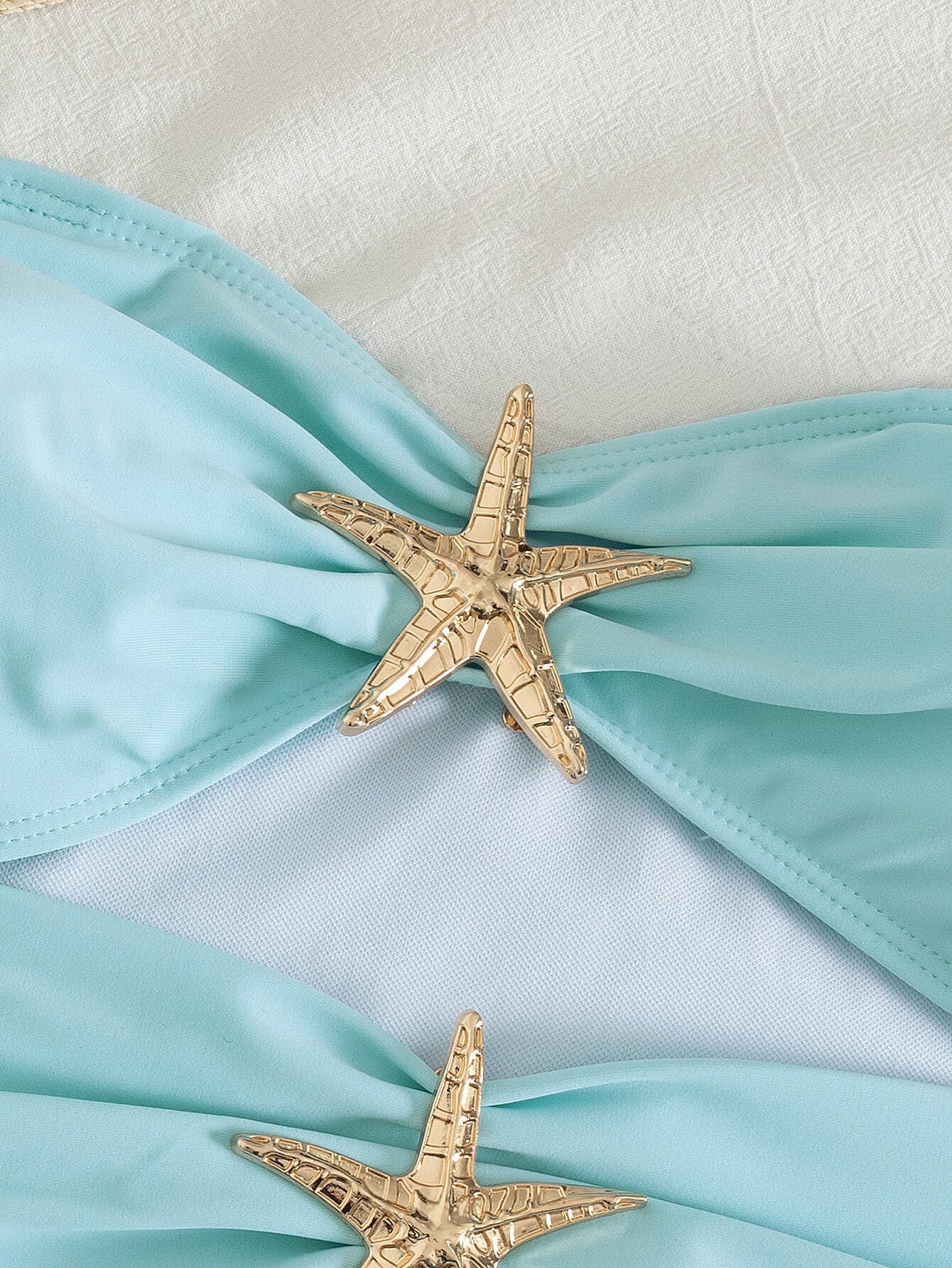 NURO Solid One-Piece Swimsuit with Starfish Detail