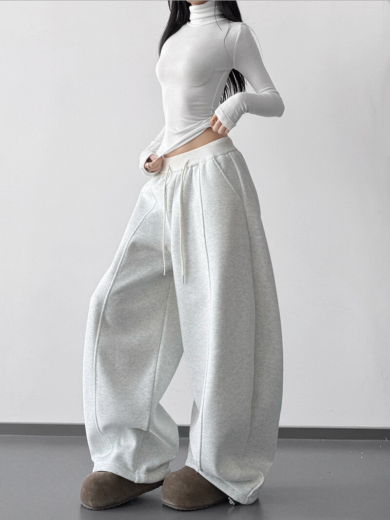 NURO Women's High Waist Flared Sweatpants - Pink Wide Leg Lounge Pants with Asymmetric Hem