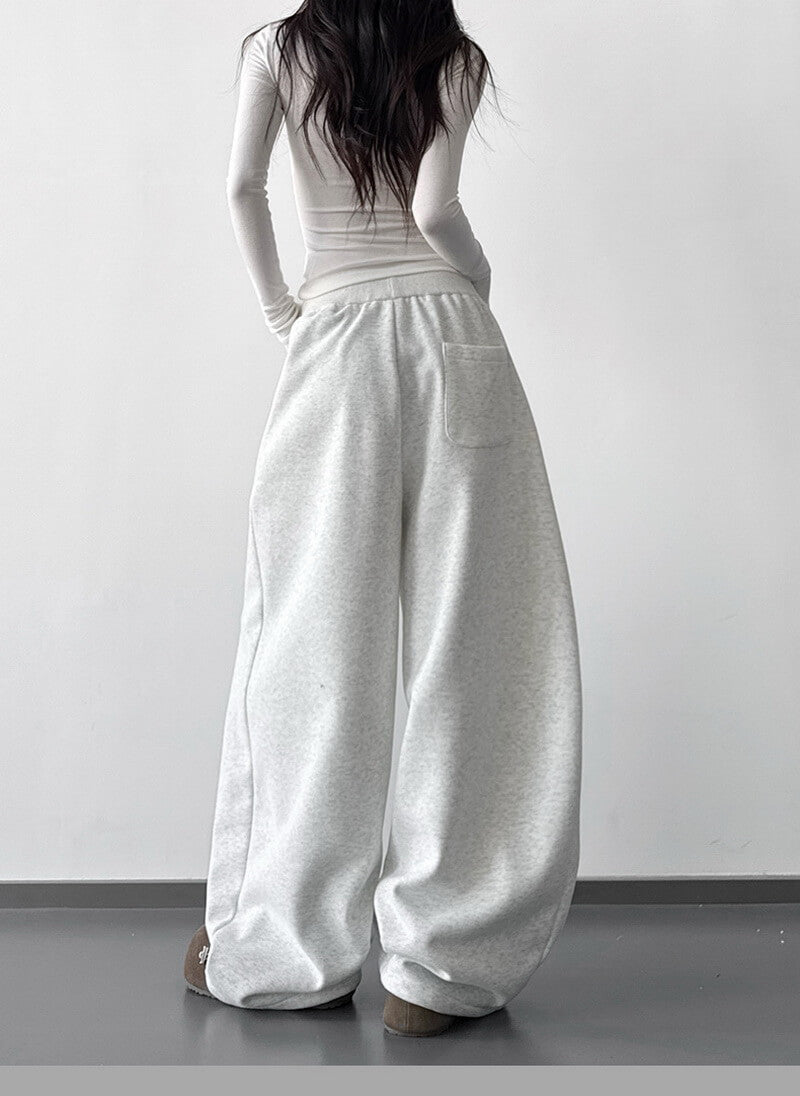 NURO Women's High Waist Flared Sweatpants - Pink Wide Leg Lounge Pants with Asymmetric Hem