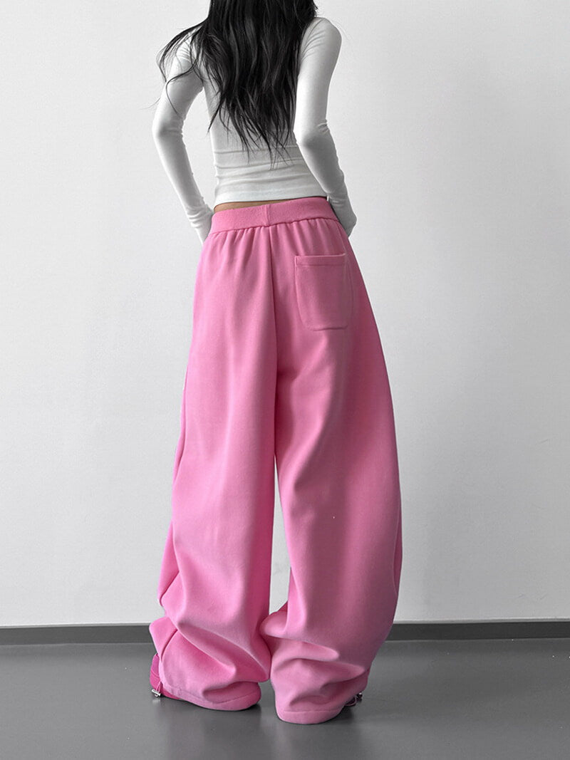 NURO Women's High Waist Flared Sweatpants - Pink Wide Leg Lounge Pants with Asymmetric Hem