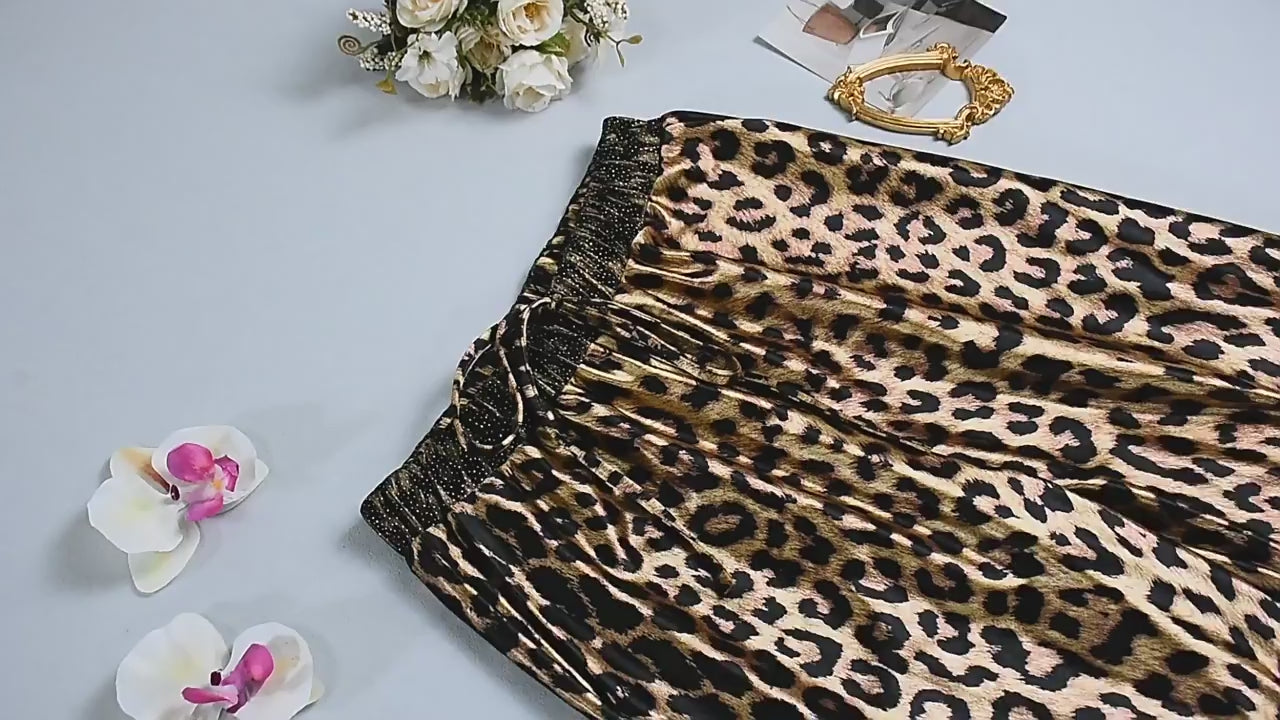 Load video: NURO Women's Leopard Print High-Waisted Wide-Leg Pants - Stretchy, Lace-Up, Street Style, Loose Fit Casual Trousers