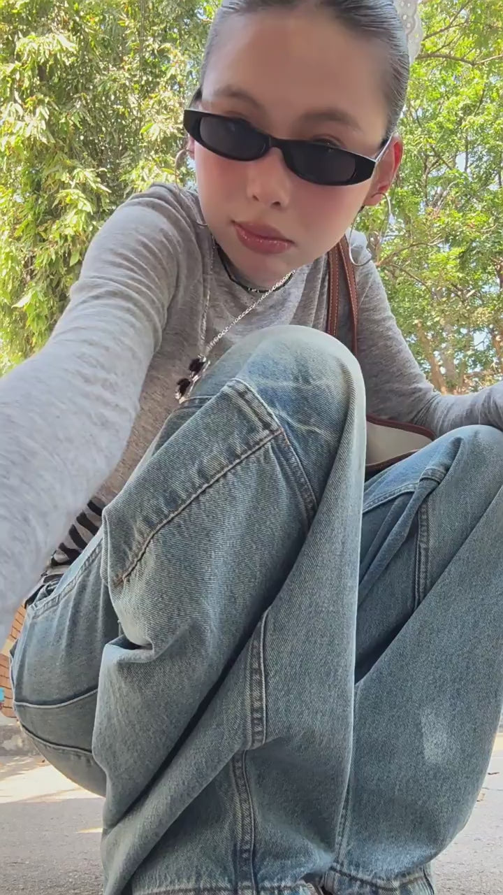 Load video: NURO Women's Distressed Patchwork Jeans, Baggy Wide Leg Cargo Pants with Asymmetrical Hem, Vintage Washed Streetwear Denim in Blue and Black