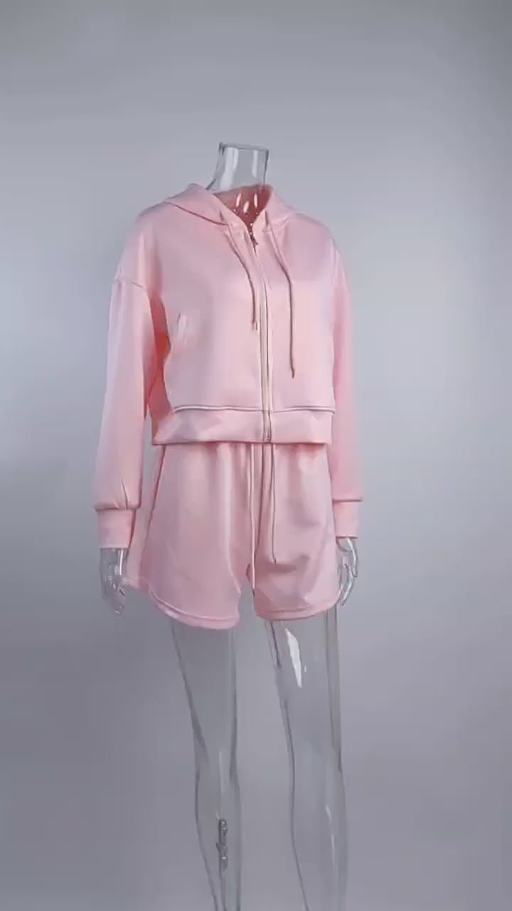 Load video: NURO Women's Cargo Pocket Sweatshirt and Shorts Set | Oversized Long Sleeve Top with Side Pockets &amp; 3/4 Length Casual Shorts | Streetwear Two-Piece Outfit