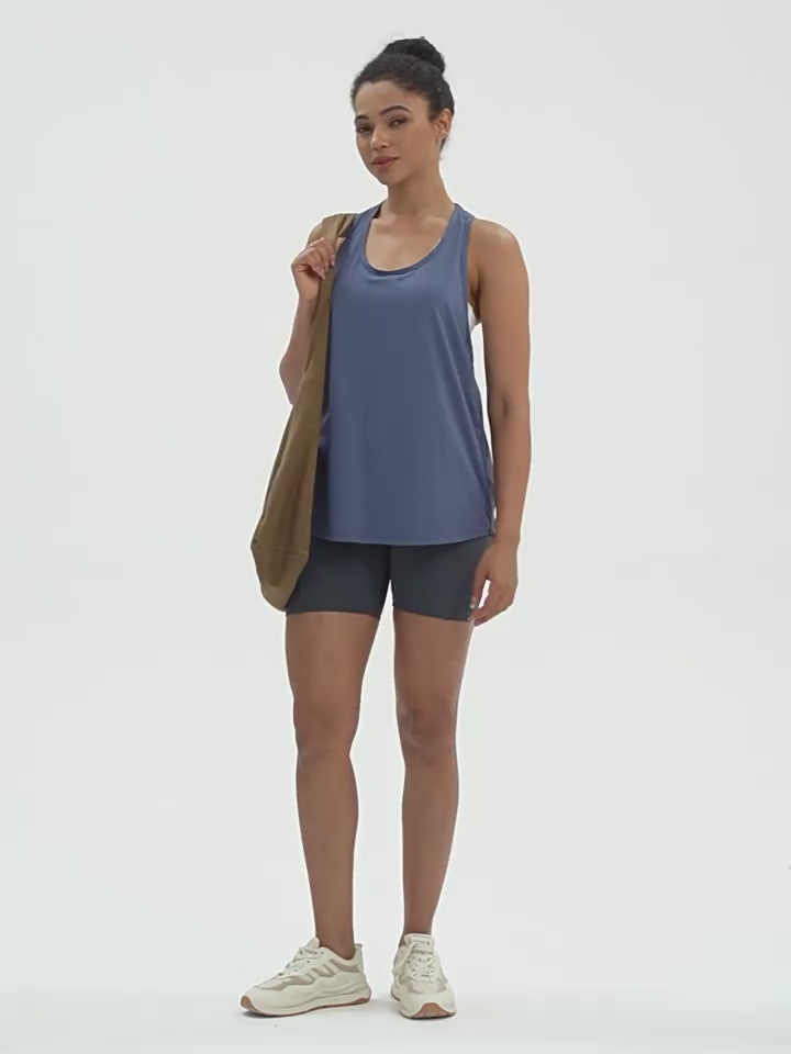 Load video: NURO Women's Loose Fit Sleeveless Workout Tank Top
